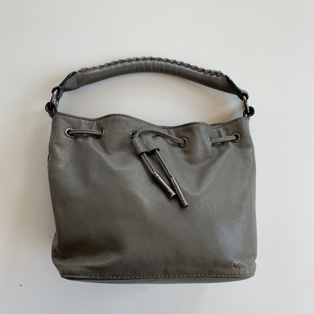 Grey Elliott Lucca purse with shoulder strap.